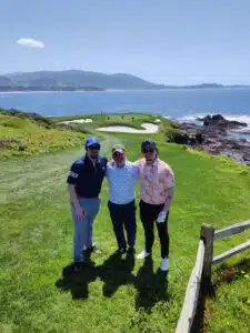 Darragh, Customer Success Associate, golfing by the sea.