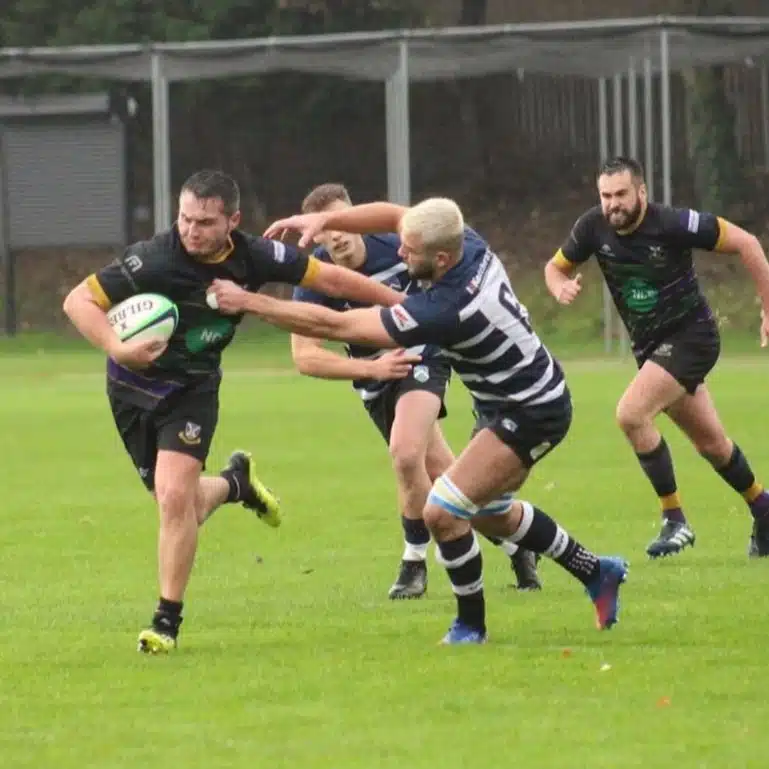 Gavin Hollins playing rugby